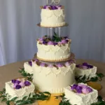 Purple Stacked Wedding cake with smaller squares off base